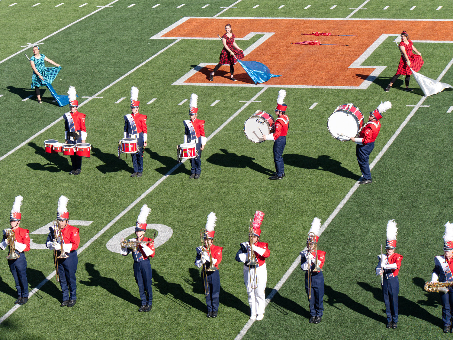 Colorguard, drumline, and brass musicians of the Alba-Golden marching band compete at the class 3A region 4 marching band competition in Texarkana on Friday.